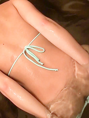 Satsuki's wild challenge was to wear this tiny blue bikini in the bathtub and keep her intimate parts from popping out. Easy for such a cute Japanese girl!