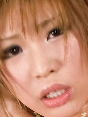 Ai Sakura Asian with oiled curves rubs her clit and rides dildo