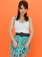 Yumi Asian is such cute and playful honey in white top and skirt